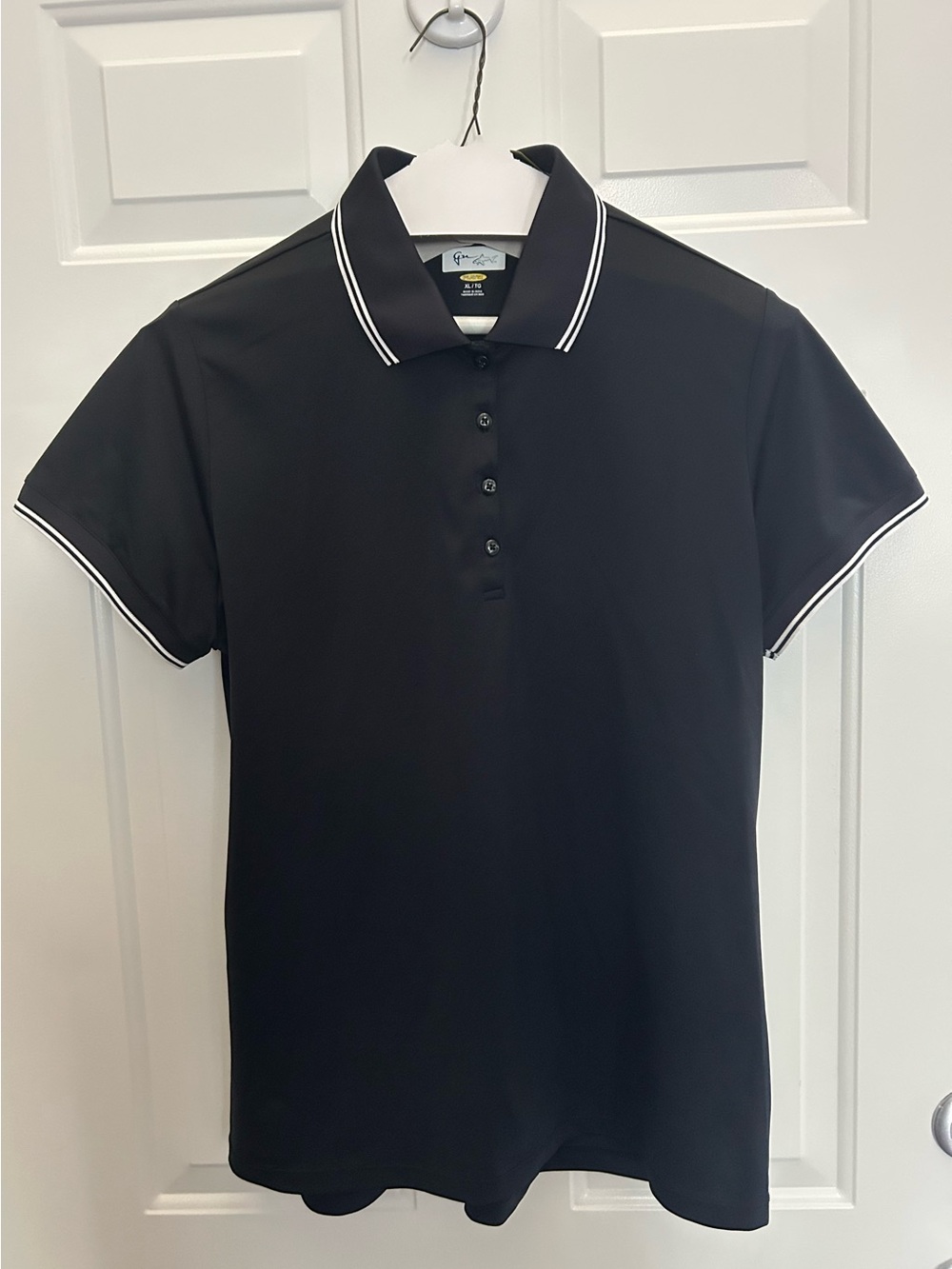 Greg Norman Golf Black Polo Shirt with White Trim. Women’s XL